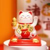 Maneki Neko napelemes szerencsehozó integető macska